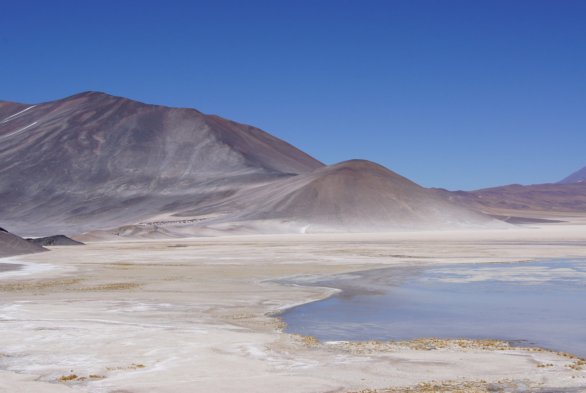 Atacama Desert in Chile: Atacama Salt Flats (Salar de Atacama) and Sand-swept Mountainous Terrain