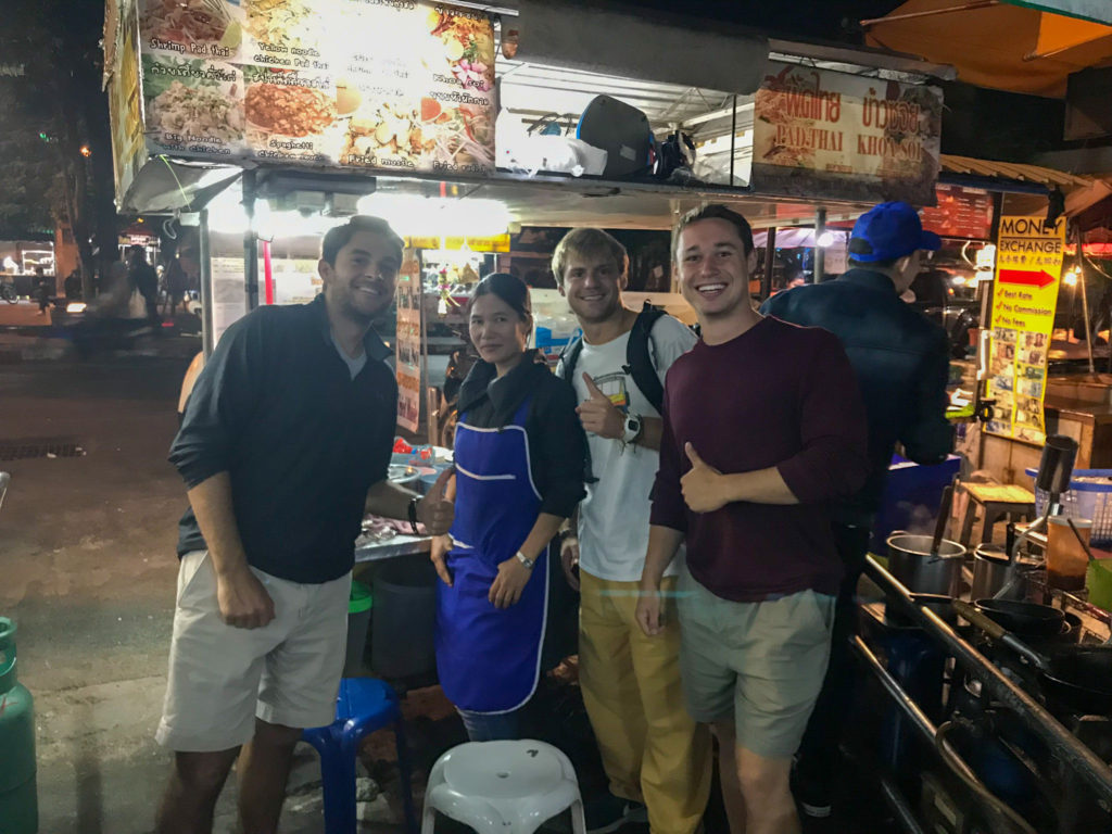 Posing in front of food vendors in Chiang Mai