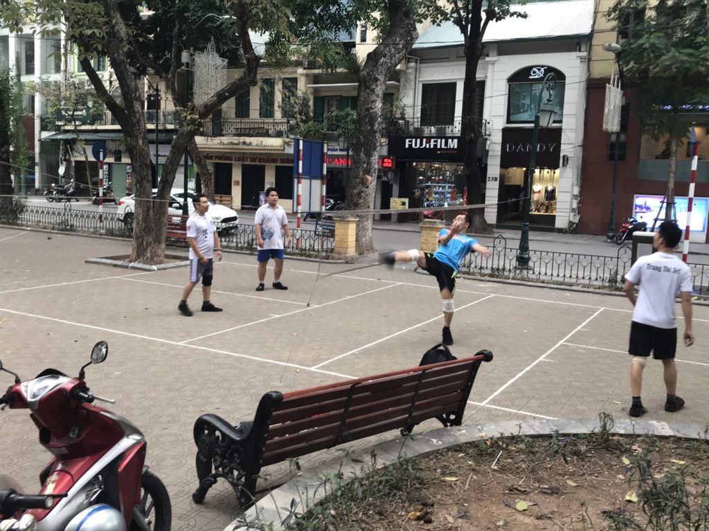 Locals playing da cau in Hanoi